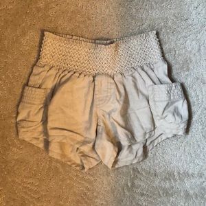 Khaki high waist shorts.